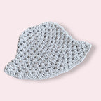 Baby blue crochet bucket hat on plain background