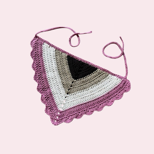 Crochet cotton bandana in asexual pride colors on a pink background