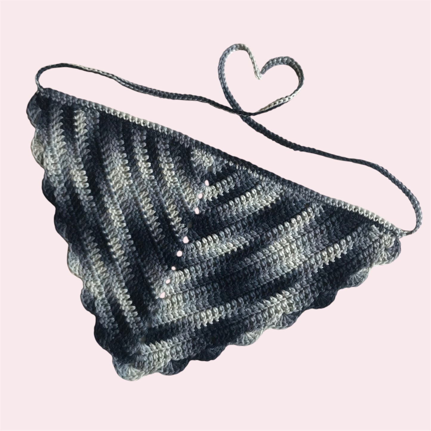 Blue crochet cotton hair bandana flatlay on pink background