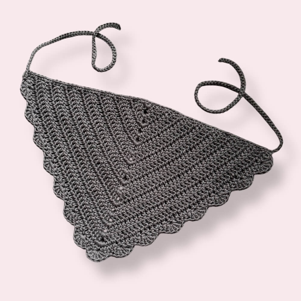 Gray crochet bandana on plain background