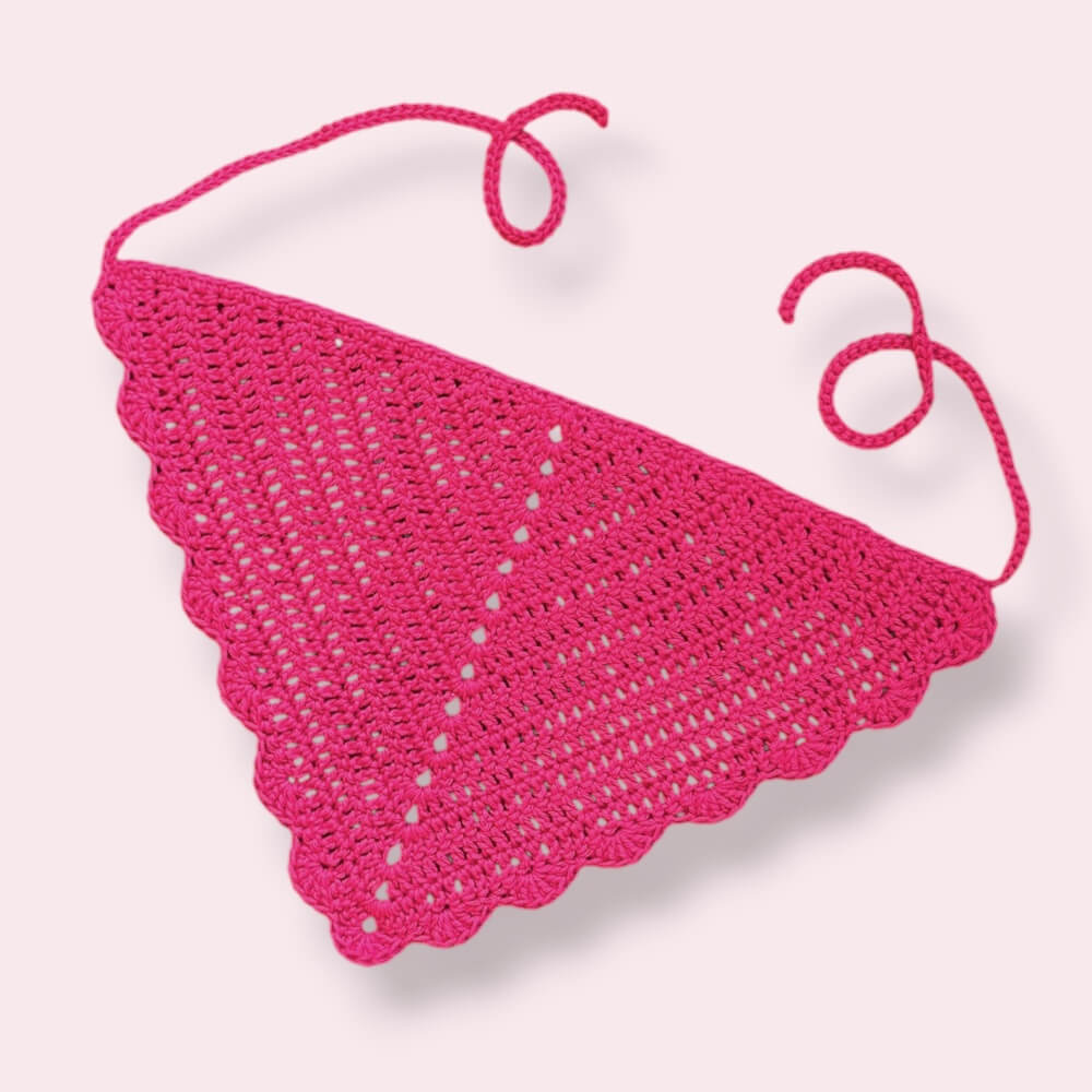 Hot pink crochet hair bandana on plain background