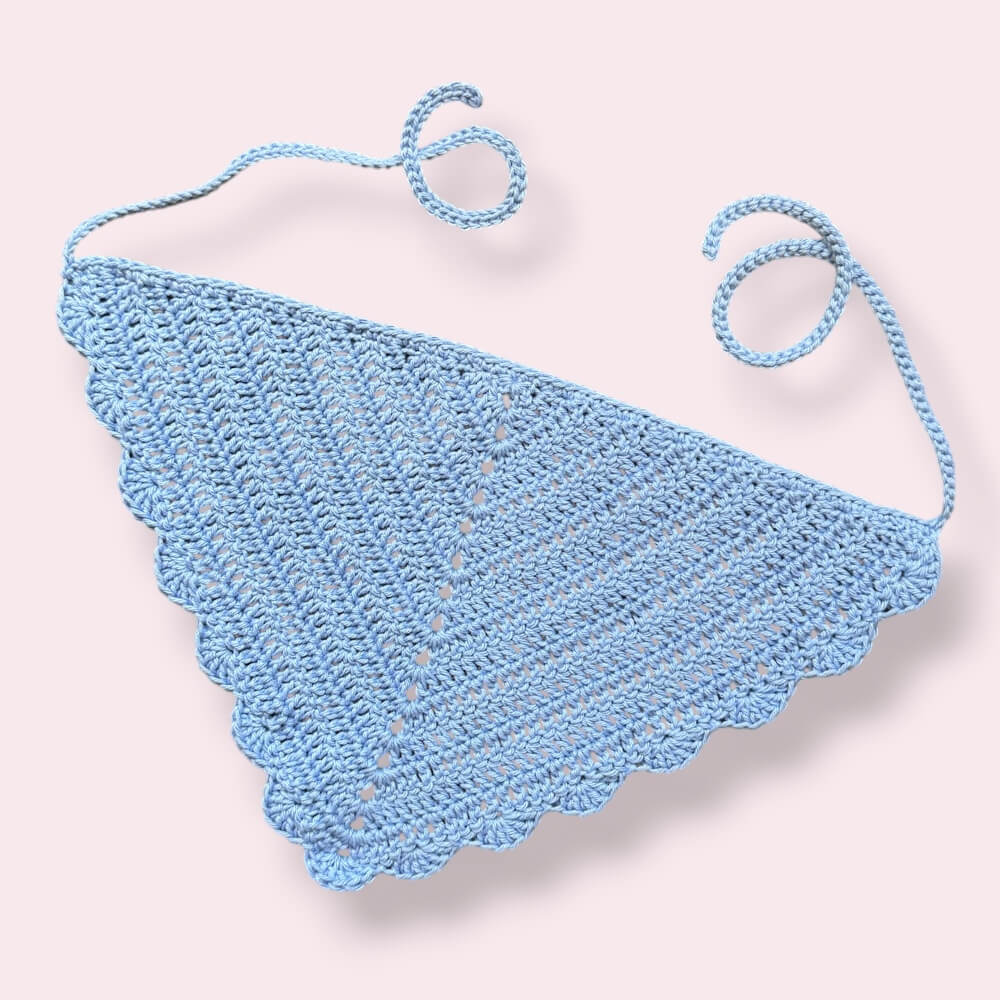 Light blue crochet hair bandana on plain background