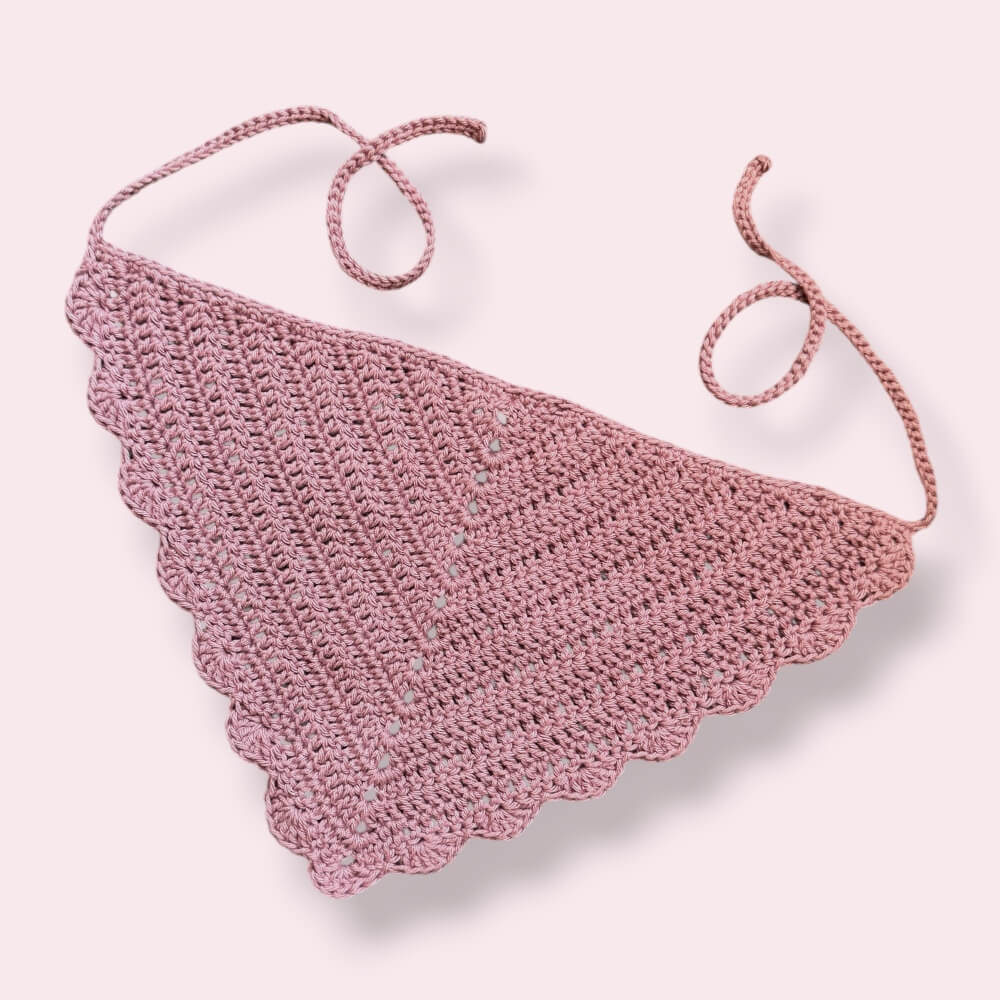 Mauve crochet hair bandana on plain background