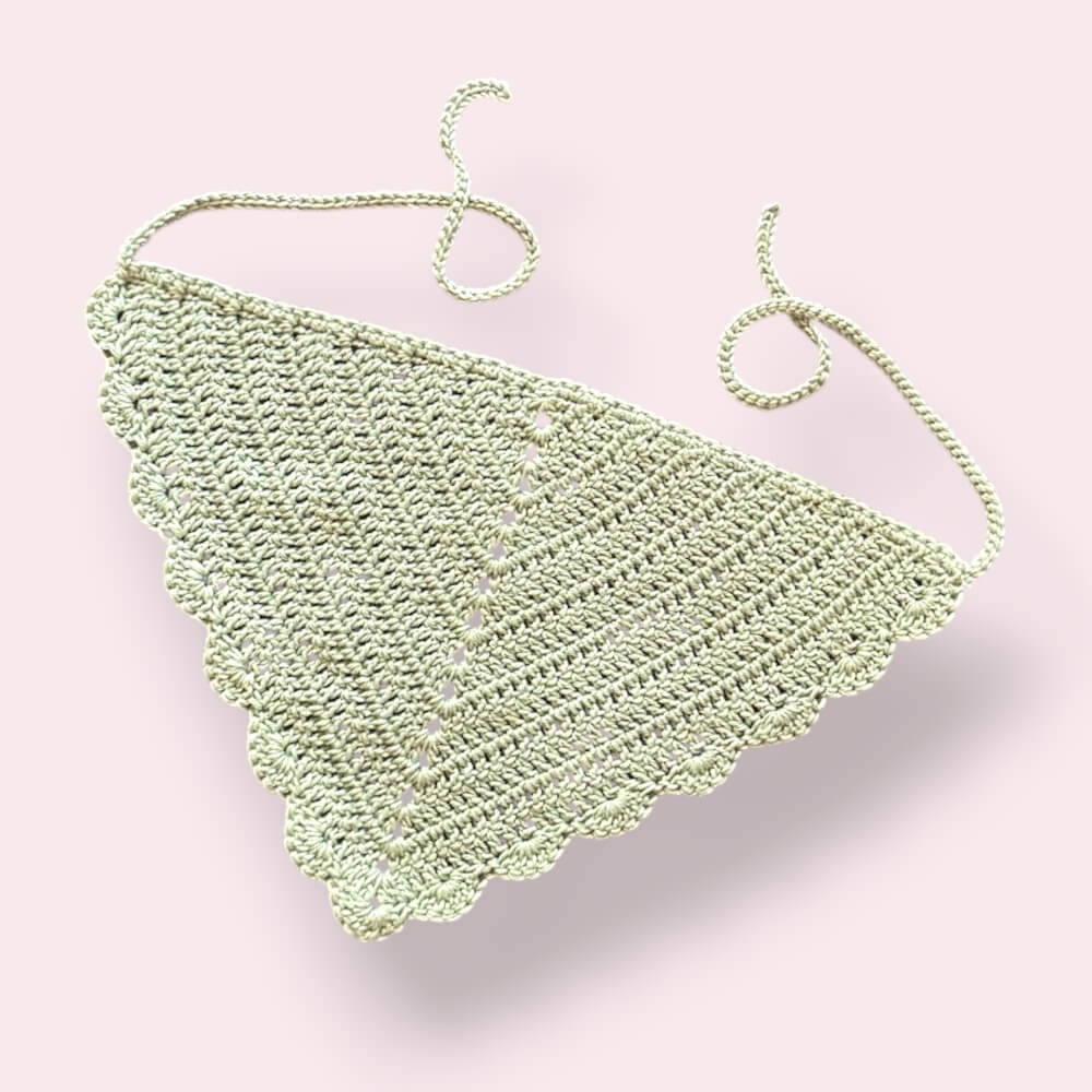 Pastel green crochet hair bandana on plain background