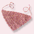 Pink and brown crochet bandana on plain background