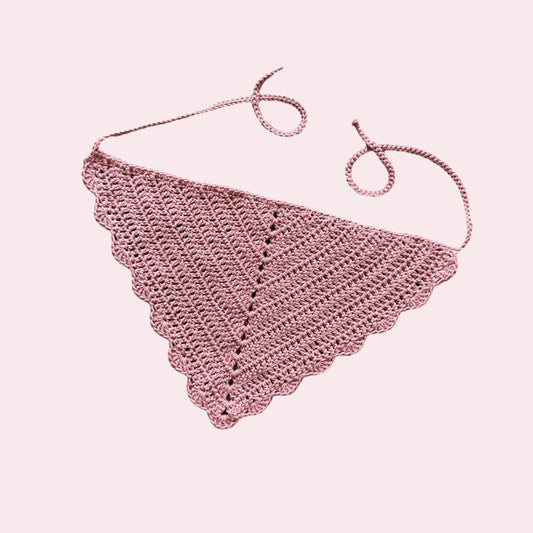 Pink crochet bandana on a pink background
