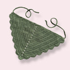 Sage green crocheted bandana on plain background