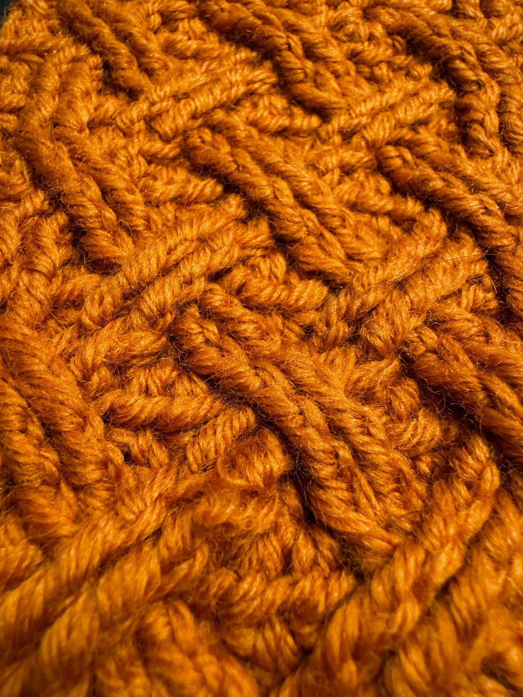 Textured orange crochet surface