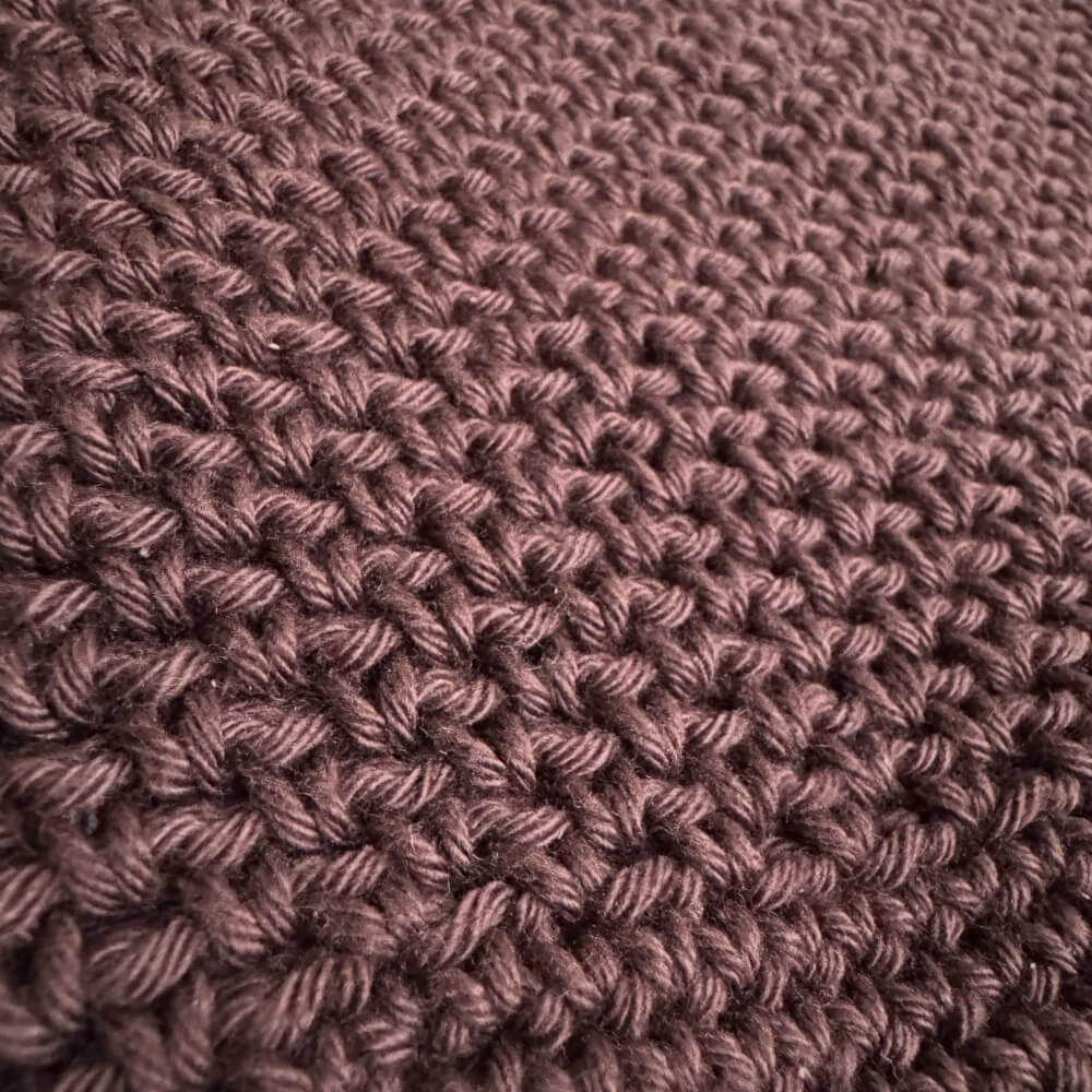 Up close texture shot of brown japanese knot bag